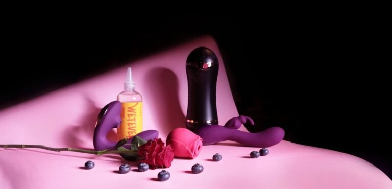 A Pink Bed With A Bottle Of Mouthwash And A Rose